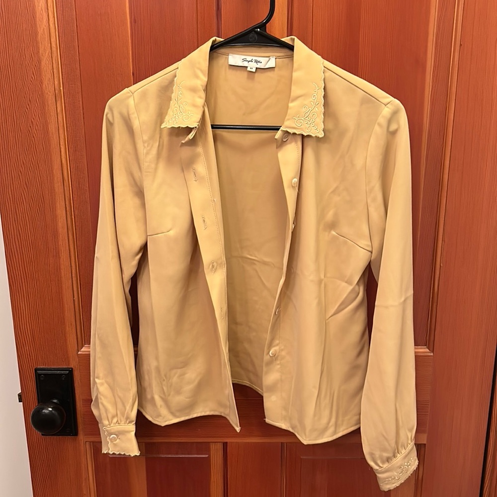 Simple retro yellow blouse with embroidered sleeve and collar